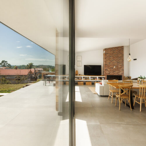 ameco-proyectos-obra-nueva-siero-salon-comedor-cocina-terraza